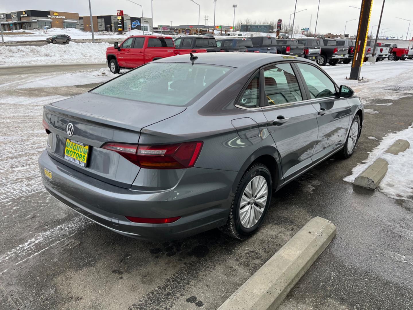 2019 Gray /Black Volkswagen Jetta 1.4T SE 8A (3VWC57BU8KM) with an 1.4L L4 DOHC 20V engine, 8A transmission, located at 1960 Industrial Drive, Wasilla, 99654, (907) 274-2277, 61.573475, -149.400146 - Photo#5